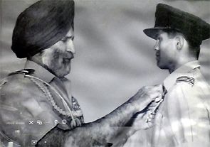 Fighter pilot Dilip K Parulkar receiving the Vayu Medal for the '65 War