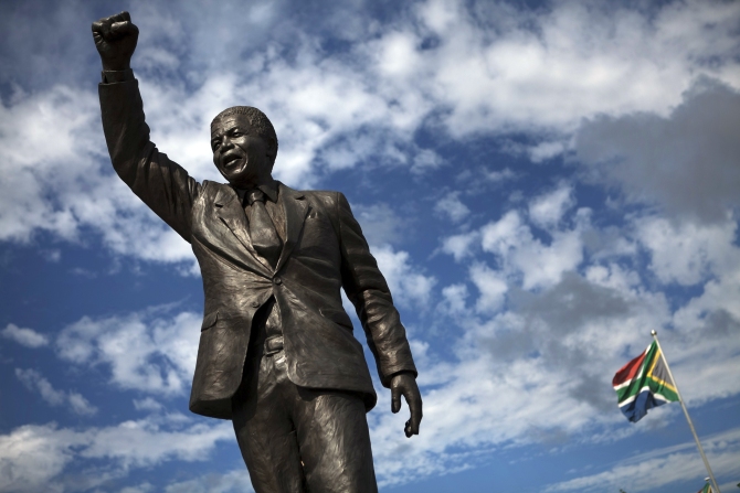 A statue of Nelson Mandela stands outside the gates of Drakenstein Correctional Centre (formerly Victor Verster Prison), near Paarl in Western Cape province.