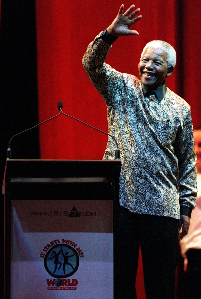 Nelson Mandela waves to the crowd at the World Reconciliation Day Concert, at the Colonial Stadium, on September 8, 2000, in Melbourne, Australia. 