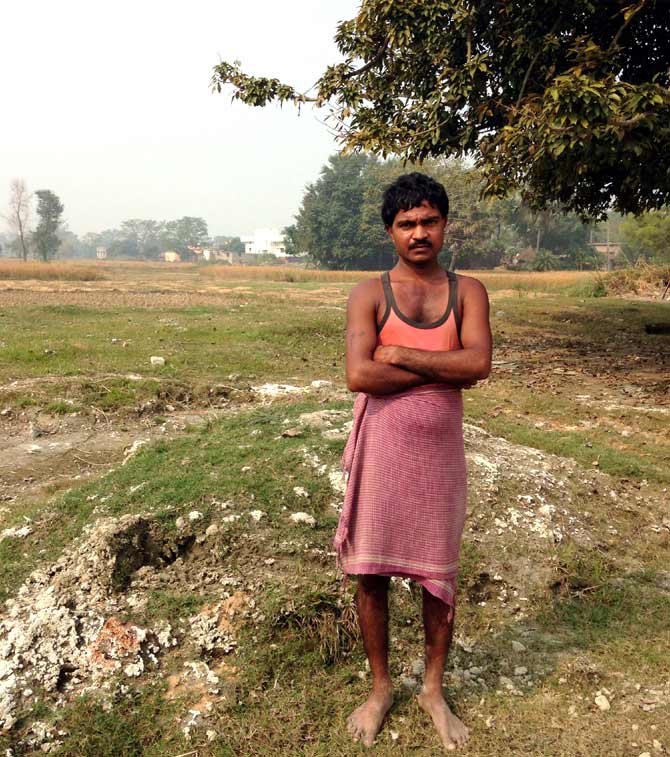 Vinod Mahato worked as a labourer in Ludhiana. He reached the village three days after his children died.