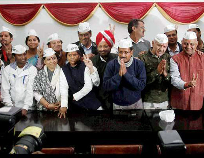 Chief Minister Arvind Kejriwal with members of his Cabinet and other party members