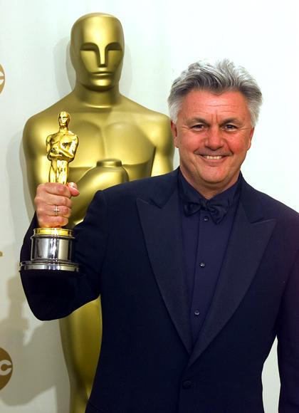 John Irving holds the Oscar he won for Best Screenplay Adaptation for the film 'The Cider House Rules',