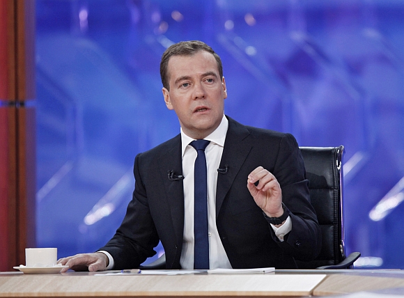 Russia's Prime Minister Dmitry Medvedev speaks during his interview with national television channels in Moscow