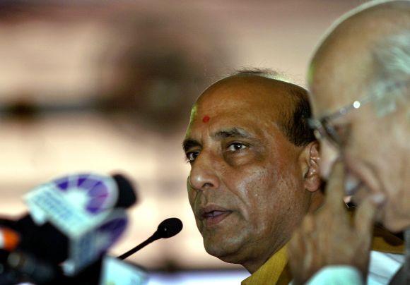 Rajnath Singh with senior BJP leader L K Advani