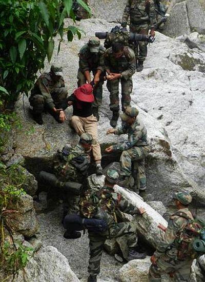 Army personnel rescue a stranded person in rain-ravaged Uttarakhand