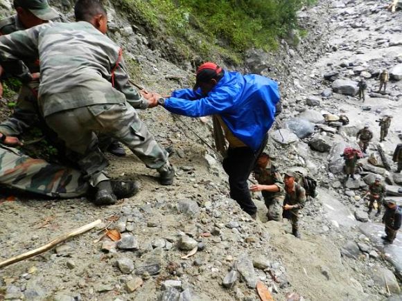 Army personnel rescue a stranded person in rain-ravaged Uttarakhand