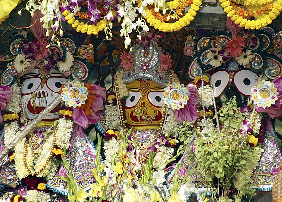 A glimpse of statues of Lord Jagannath (R), Lord Balaram (L) and Goddess Subadhra