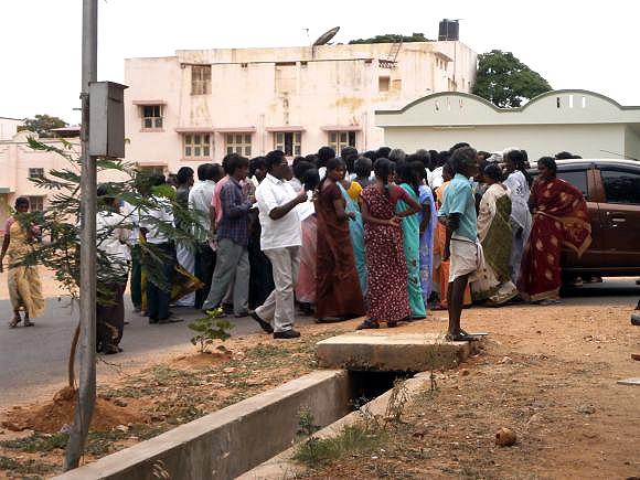 Ilavarasan's relatives outside the Dharmapuri Medical College Hospital in Tamil Nadu on Wednesday, waiting for news of his second post-mortem