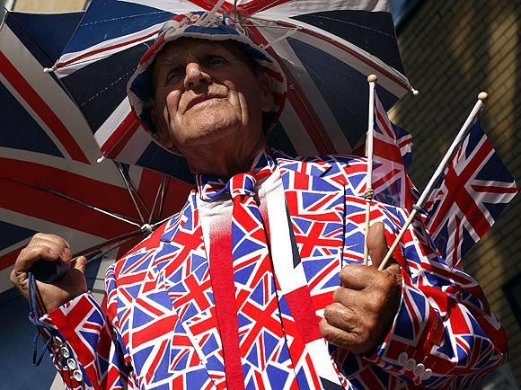 A royal supporter stands outside the Lindo Wing of St Mary's Hospital, where Britain's Catherine, Duchess of Cambridge is due to give birth