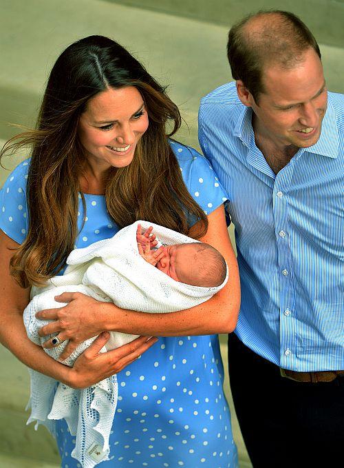 Britain's Prince William and his wife Catherine, Duchess of Cambridge appear with their baby son outside the Lindo Wing of St Mary's Hospital, in central London