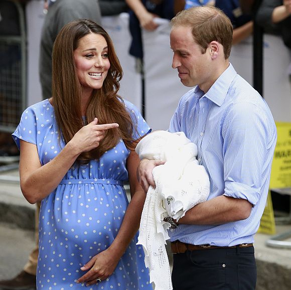 Britain's Prince William and his wife Catherine, Duchess of Cambridge appear with their baby son outside the Lindo Wing of St Mary's Hospital, in central London