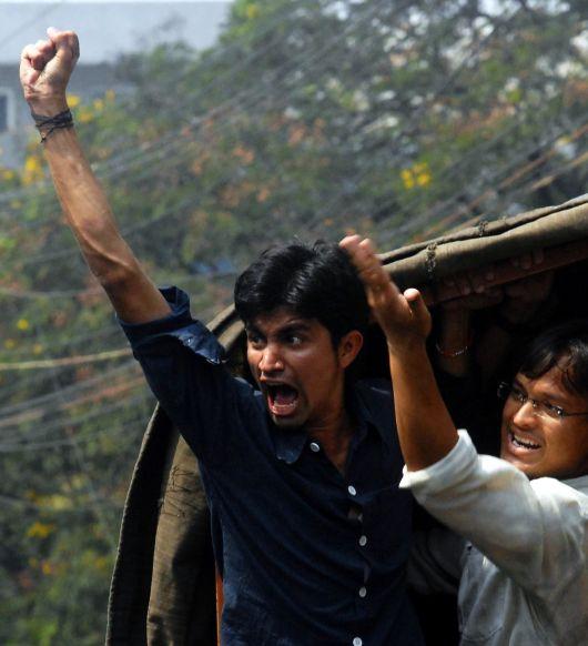 Police detain pro-Telangana activists in Hyderabad during an agitation for separate state