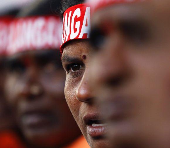 Pro-Telangana protestors shout slogans during a demonstration in New Delhi