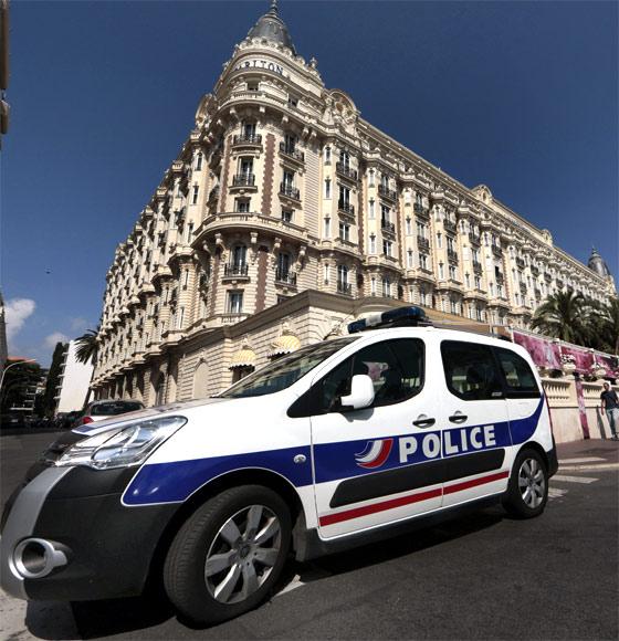 A police car parked outside the Carlton hotel in Cannes, from where gems worth Rs 8.2 billion were stolen in an audacious heist