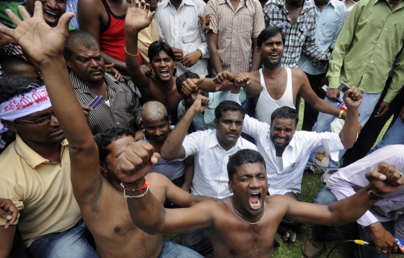 Supporters demanding a separate Telangana state protest in Hyderabad on July 12, 2011