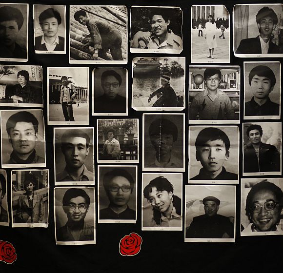 Photos of those who died in a military crackdown on pro-democracy movement at Beijing's Tiananmen Square in June 4, 1989, are displayed at a 'June 4 Memorial Museum' inside a university in Hong Kong