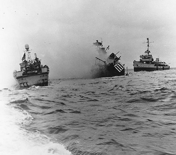 USS Tide sinking off 'Utah' beach after striking a mine during the Normandy invasion