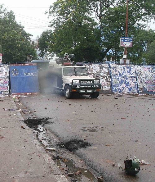 A police vehicle that came under attack from Telangana protestors