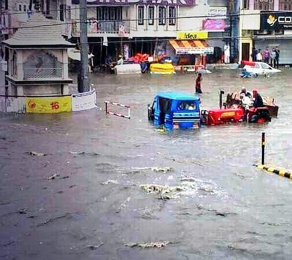 Vehicles are submerged in the rising waters in Haridwar, Uttarakhand