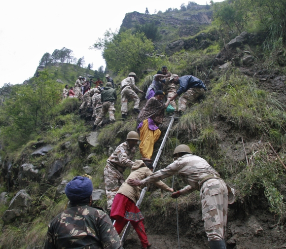 Soldiers rescue stranded people after heavy rains in Uttarakhand