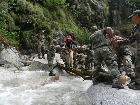 Army men rescue a tourist stranded in Uttarakhand