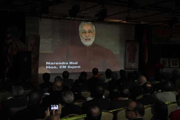 Indian Americans watch the video conference of Narendra Modi in New Jersey