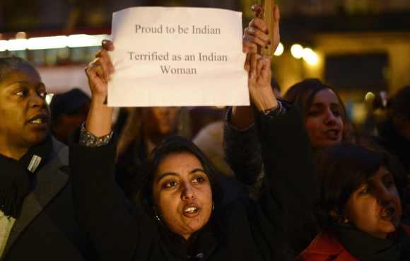 A woman participates in an anti-rape protest