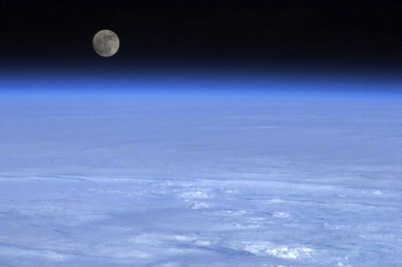 The moon is pictured above Earth