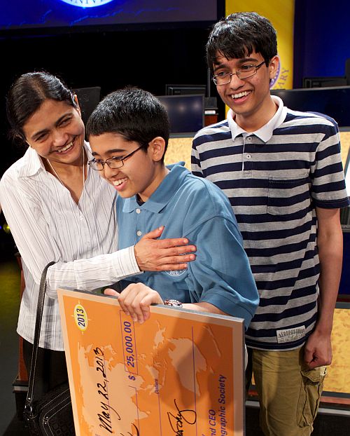 2013 National Geographic Bee winner Sathwik Karnik of Massachusetts is congratulated by his father, Vishwanath (not in picture), mother Rathna and brother Karthik. Karthik finished in the top 10 of the National Geographic Bee in 2011 and 2012