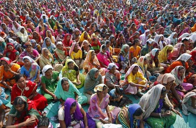 A crowd listens to Congress President Sonia Gandhi at an election rally in Godsamba, Gujarat, 2012.