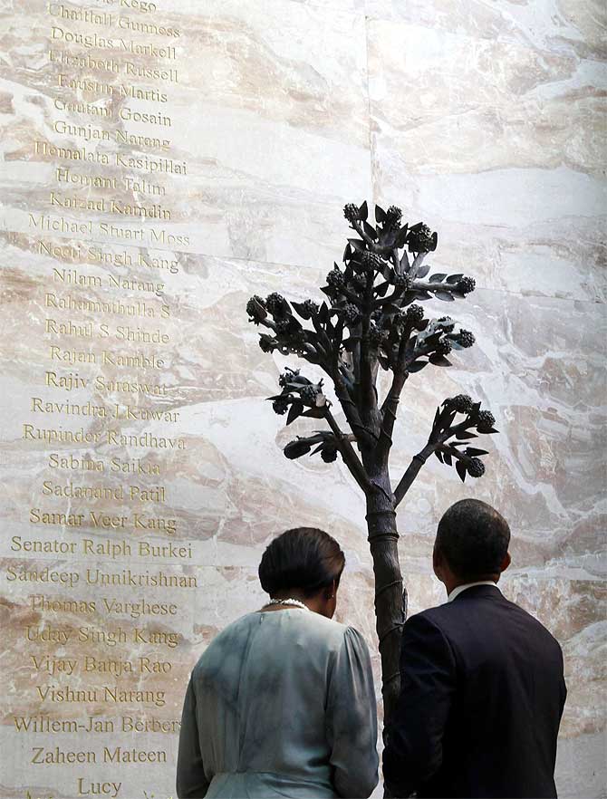 US President Barack Obama and First Lady Michelle Obama at the 26/11 memorial at the Taj Mahal Hotel in Mumbai, November 2010.