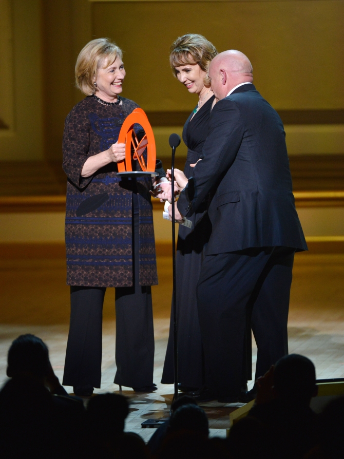 Hillary Rodham Clinton, Gabrielle Giffords and Mark Kelly at the award function 