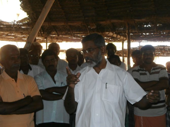 Leader of the anti-nuclear power plant protests S P Udaykumar speaks to villagers. He called the blast 'shameful'