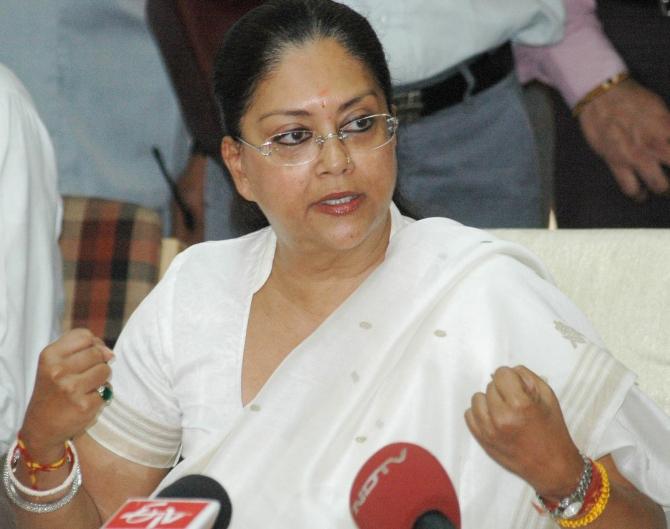 BJP's Rajasthan chief ministerial candidate Vasundhara Raje addresses a news conference in Jaipur