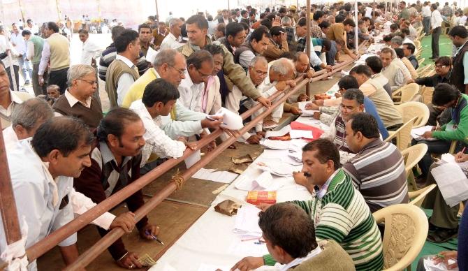 Last-minute preparations at a polling booth