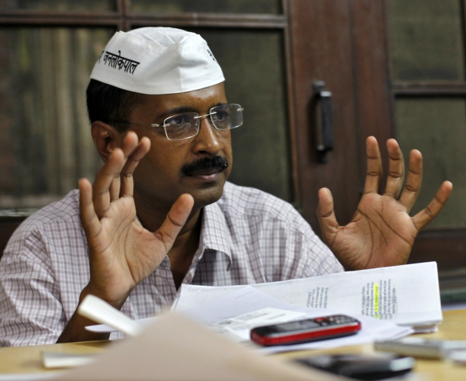 Arvind Kejriwal gestures as he speaks during an interview with Reuters in Ghaziabad on the outskirts of New Delhi 
