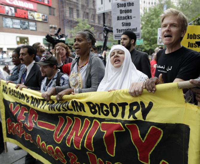 Protesters march in the 'Rally Against War, Racism & Islamophobia' to mark the 10th anniversary of the 9/11 attacks on the WorldTradeCenter, in New York 