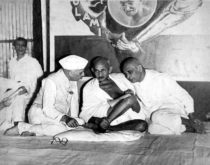 Mahatma Gandhi flanked by his closest disciples, Jawaharlal Nehru and Vallabhbhai Patel
