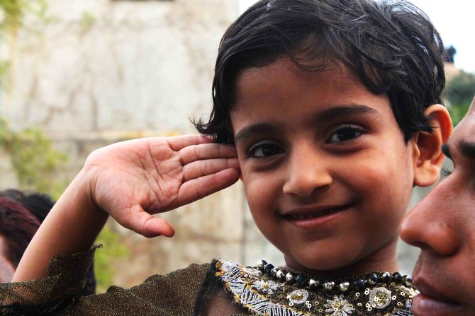 Firoz Khan's 4-year-old daughter Afshin Fatima seen saluting her father with a smiling face on Thursday