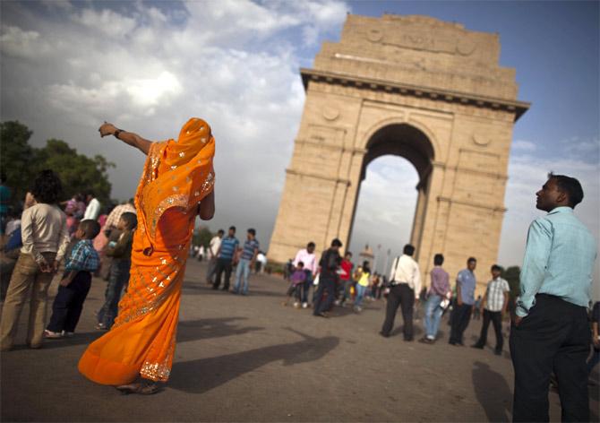 Tourists at the India Gate in Delhi.