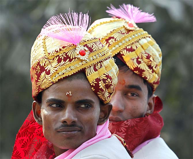 Grooms at a mass marriage ceremony in Noida, UP.