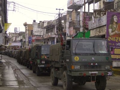 Army trucks patrol the streets of Mozaffarnagar