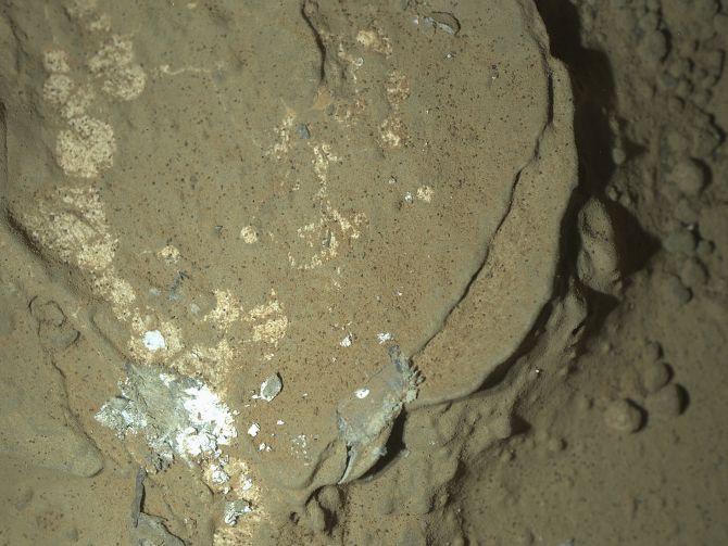 A Martian rock illuminated by white LEDs is pictured in this NASA photo