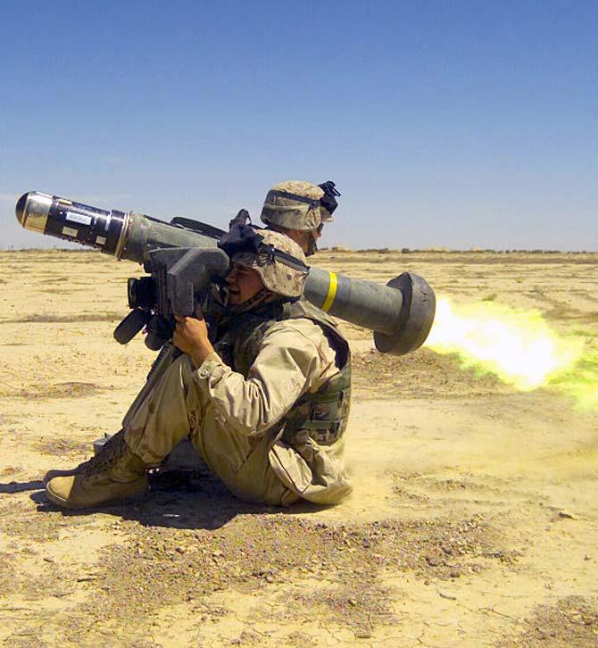 A US Army soldier checks the Javelin's backblast