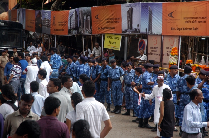 Rapid Action Force personnel stand guard near Lower Parel on the final immersion day