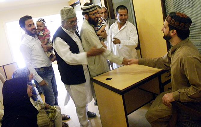 The Mirwaiz meets people at his residence at Nagin Lake