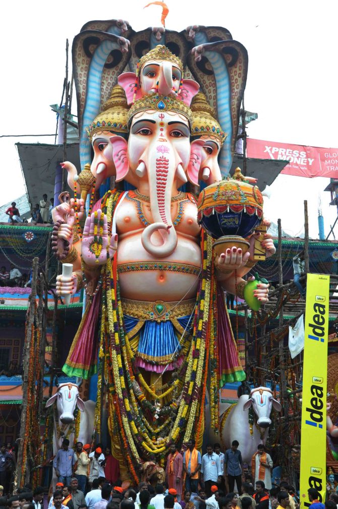 The Khairatabad Ganesh idol with the huge ladoo in his hand.