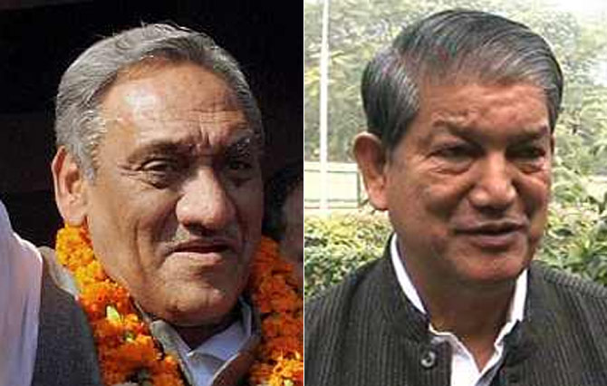 Uttarakhand Chief Minister Vijay Bahuguna (left) and Union Minister Harish Rawat