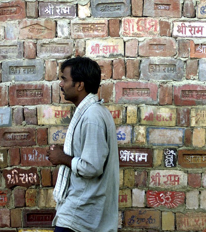 A temple wall, where devotees have written the name of Lord Ram, in Ayodhya.