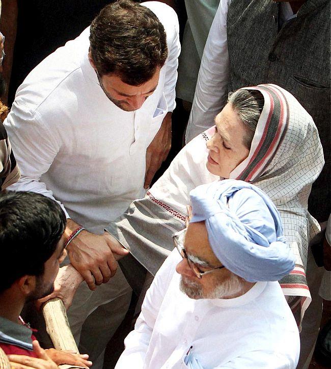 Prime Minister Manmohan Singh with Congress President Sonia Gandhi and party Vice-President Rahul Gandhi.